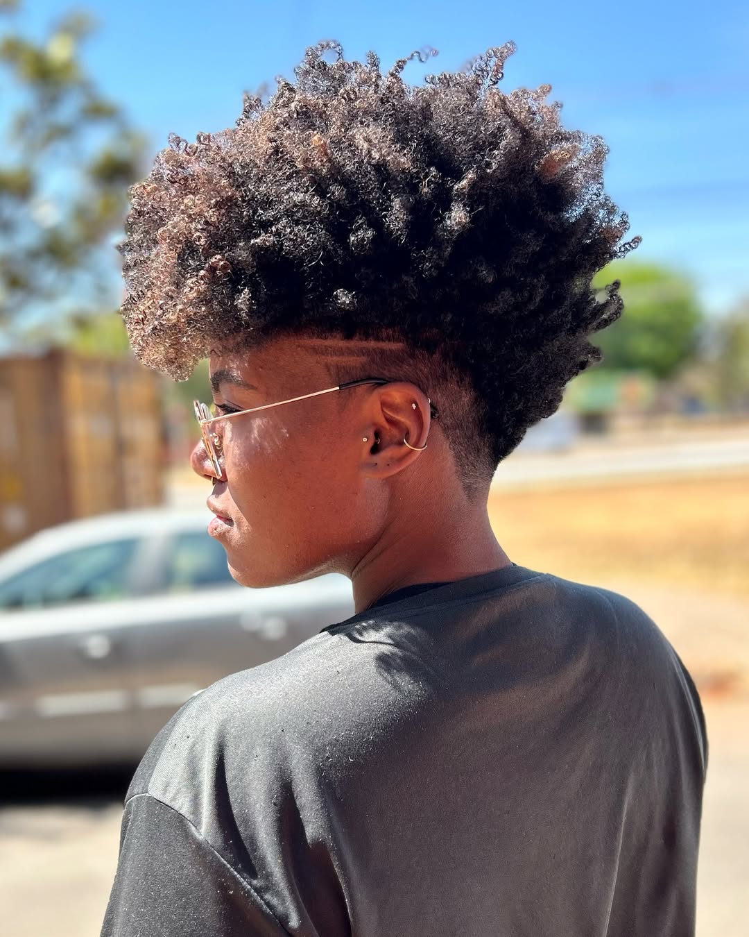 Tapered Curly Short Hair with Shaved Designs
