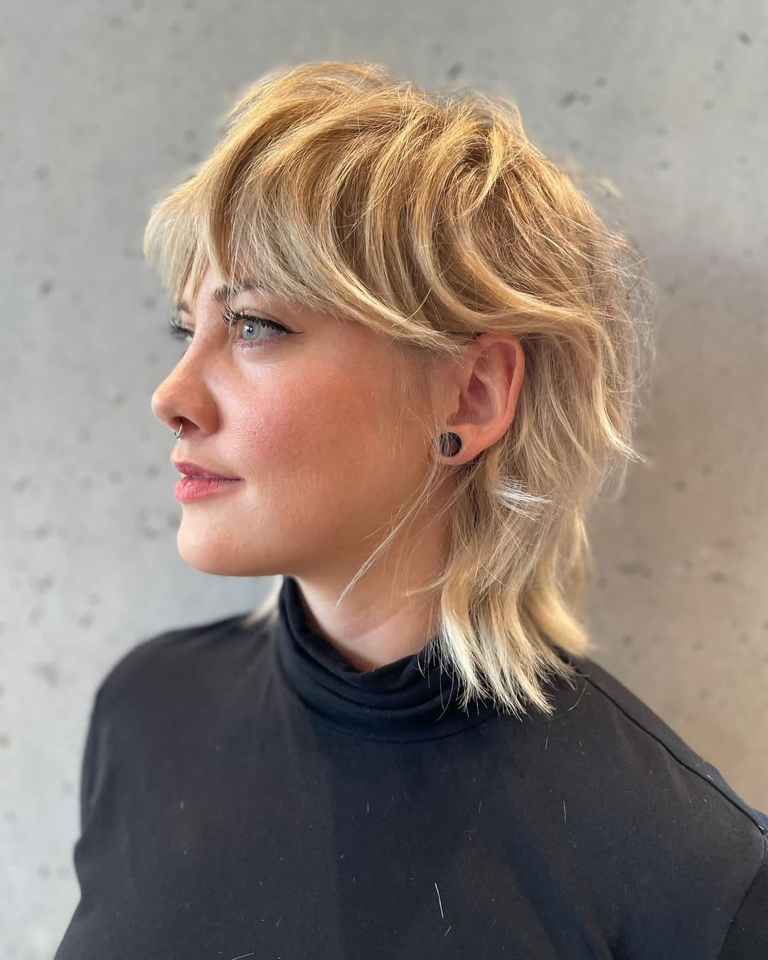 Textured Blonde Mullet With Wispy Bangs