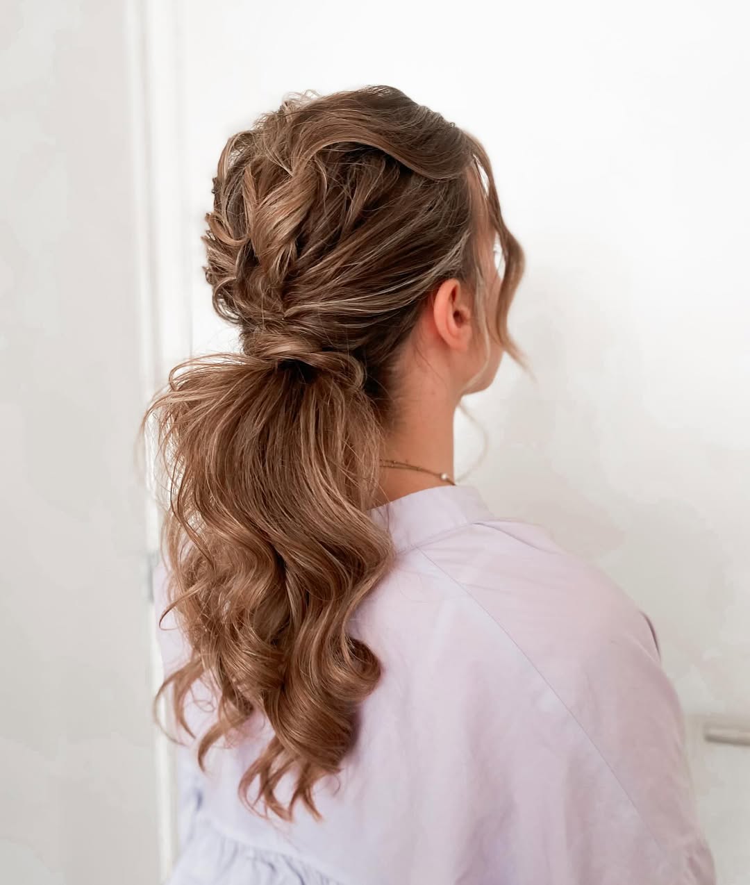 Textured Braided Ponytail With Wavy Ends