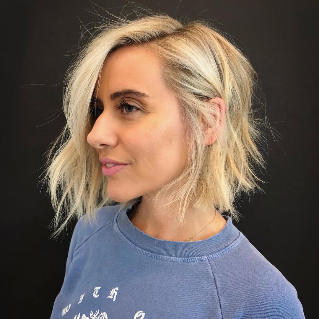 Textured Chin-Length Blonde Bob with Deep Side Part