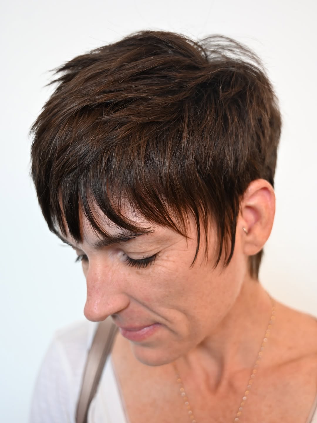 Textured Espresso Pixie With Wispy Bangs