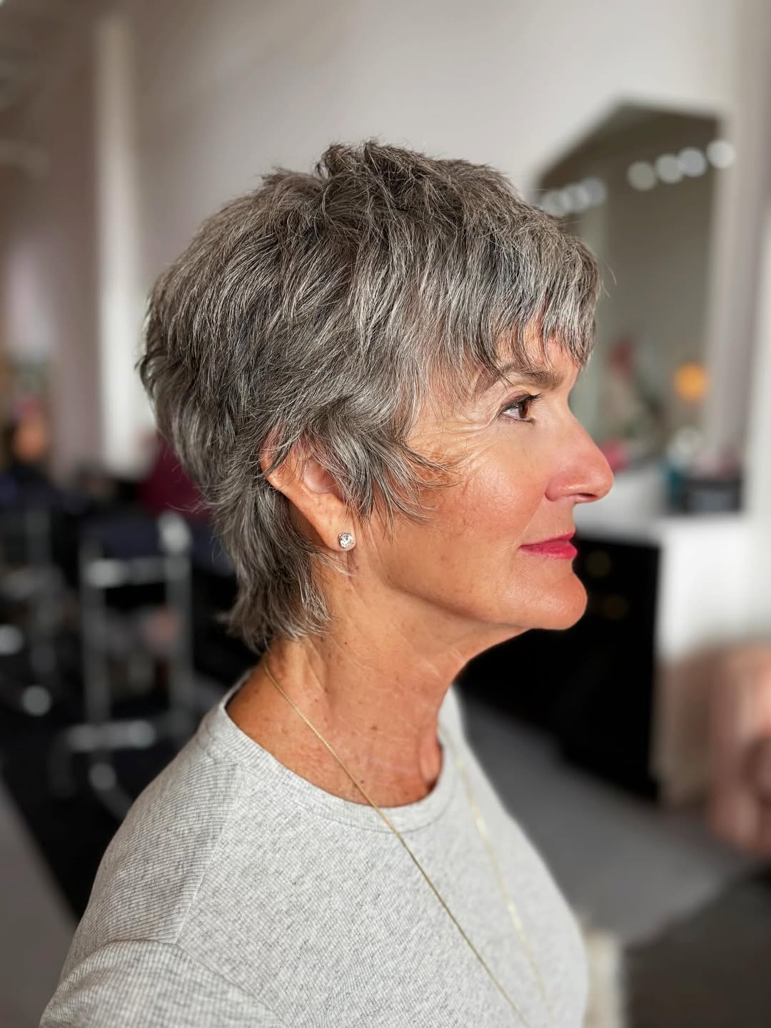 Textured Gray Pixie Cut With Wispy Bangs