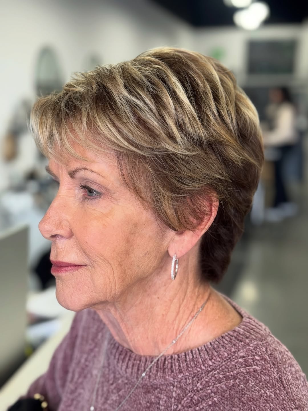 Textured Platinum Blonde Pixie With Honey Highlights