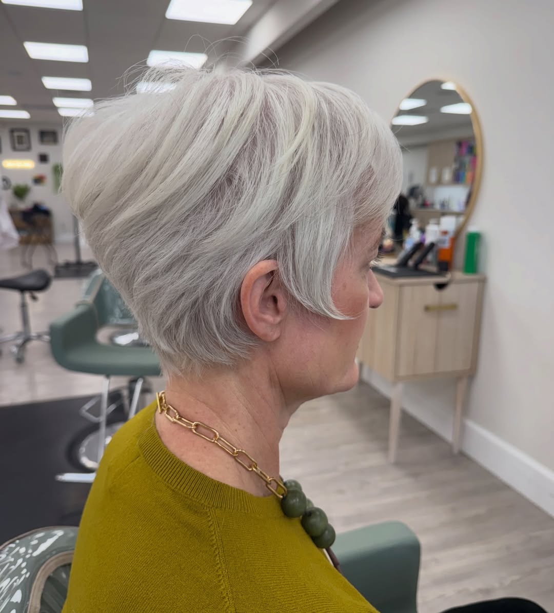 Textured Silver Pixie With Side-Swept Bangs