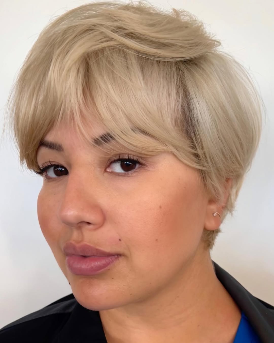 Tousled Honey Blonde Pixie With Wispy Bangs