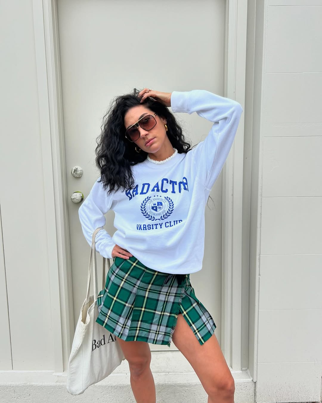 Varsity Crewneck With Plaid Mini Skirt Outfit