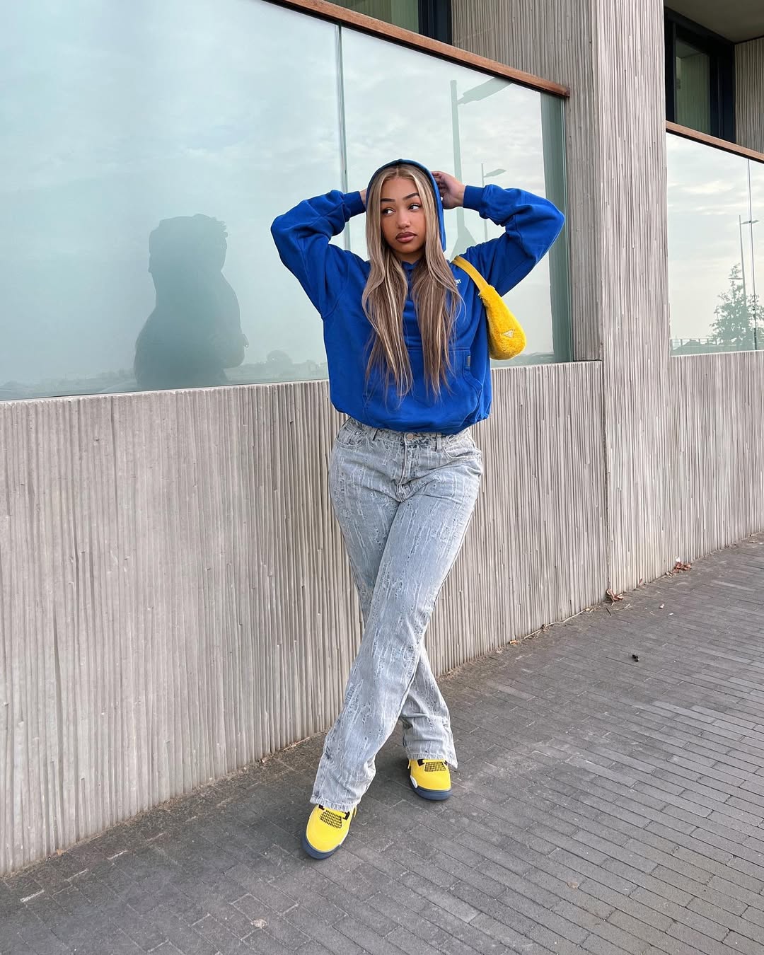 Vibrant Blue Hoodie With Light Wash Jeans