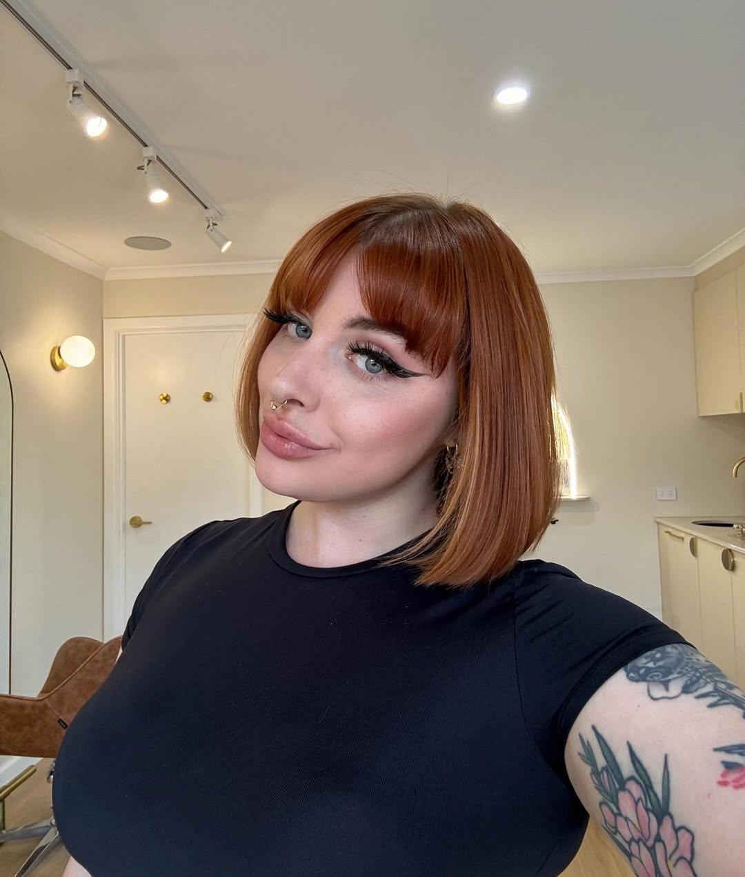 Vibrant Copper Bob With Blunt Bangs