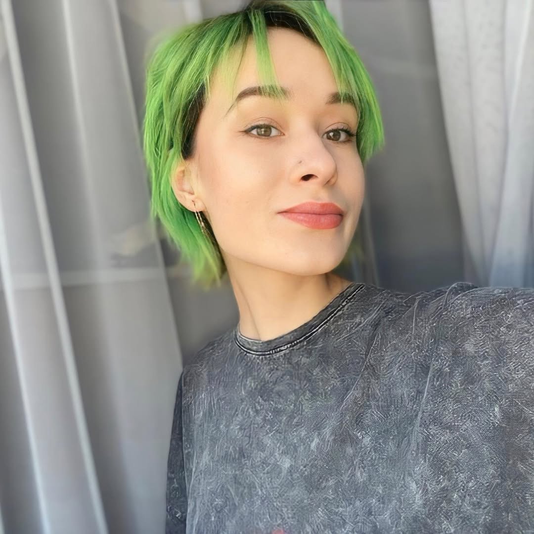 Vibrant Green Pixie Shag With Choppy Bangs
