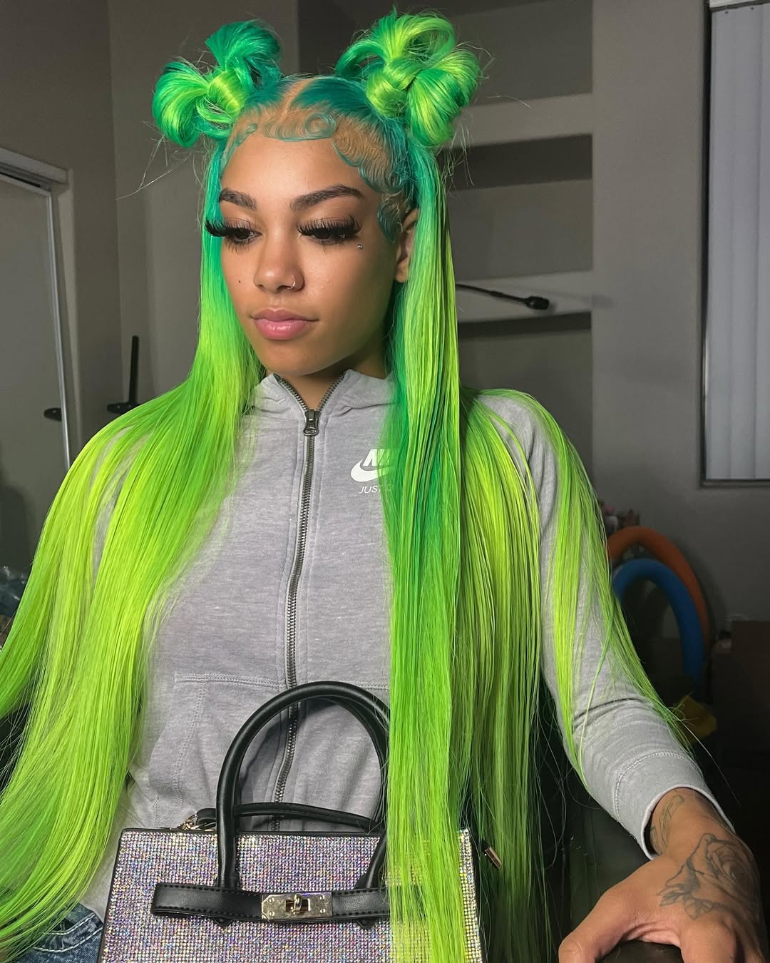 Vibrant Green Space Buns With Slick Edges