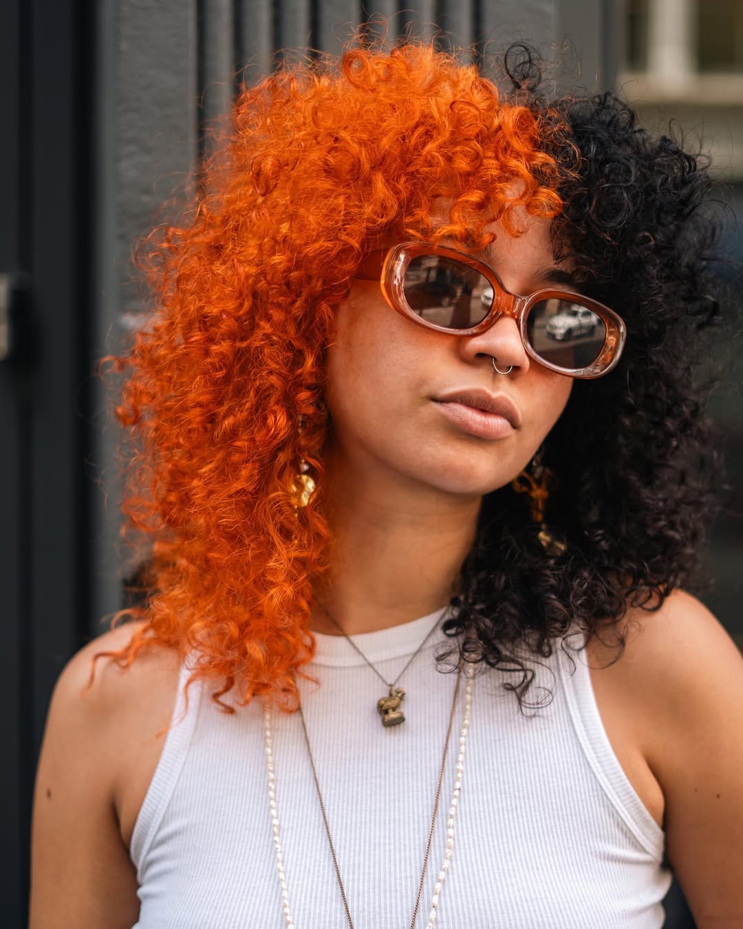 Vibrant Half Orange Half Black Curly Hair