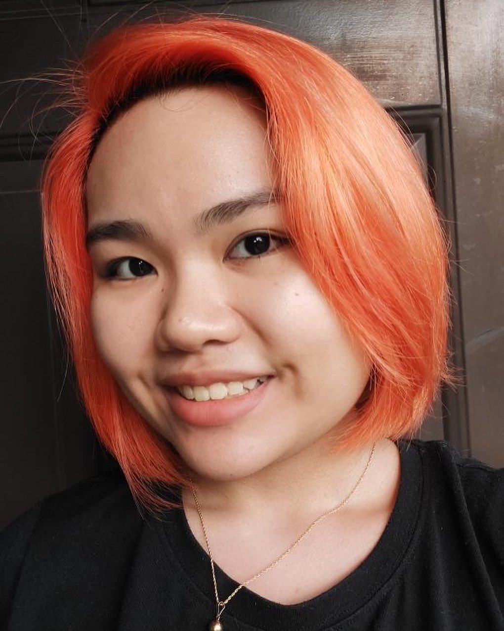 Vibrant Mandarin Orange Chin Length Straight Bob