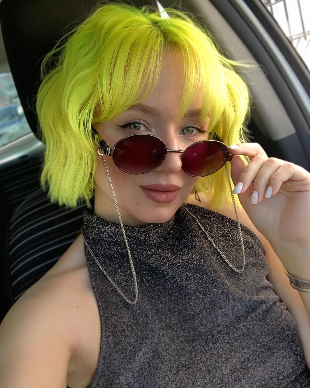 Vibrant Neon Green Wavy Bob With Bangs