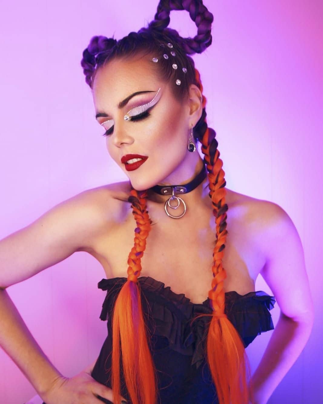 Vibrant Orange Braids With Space Buns