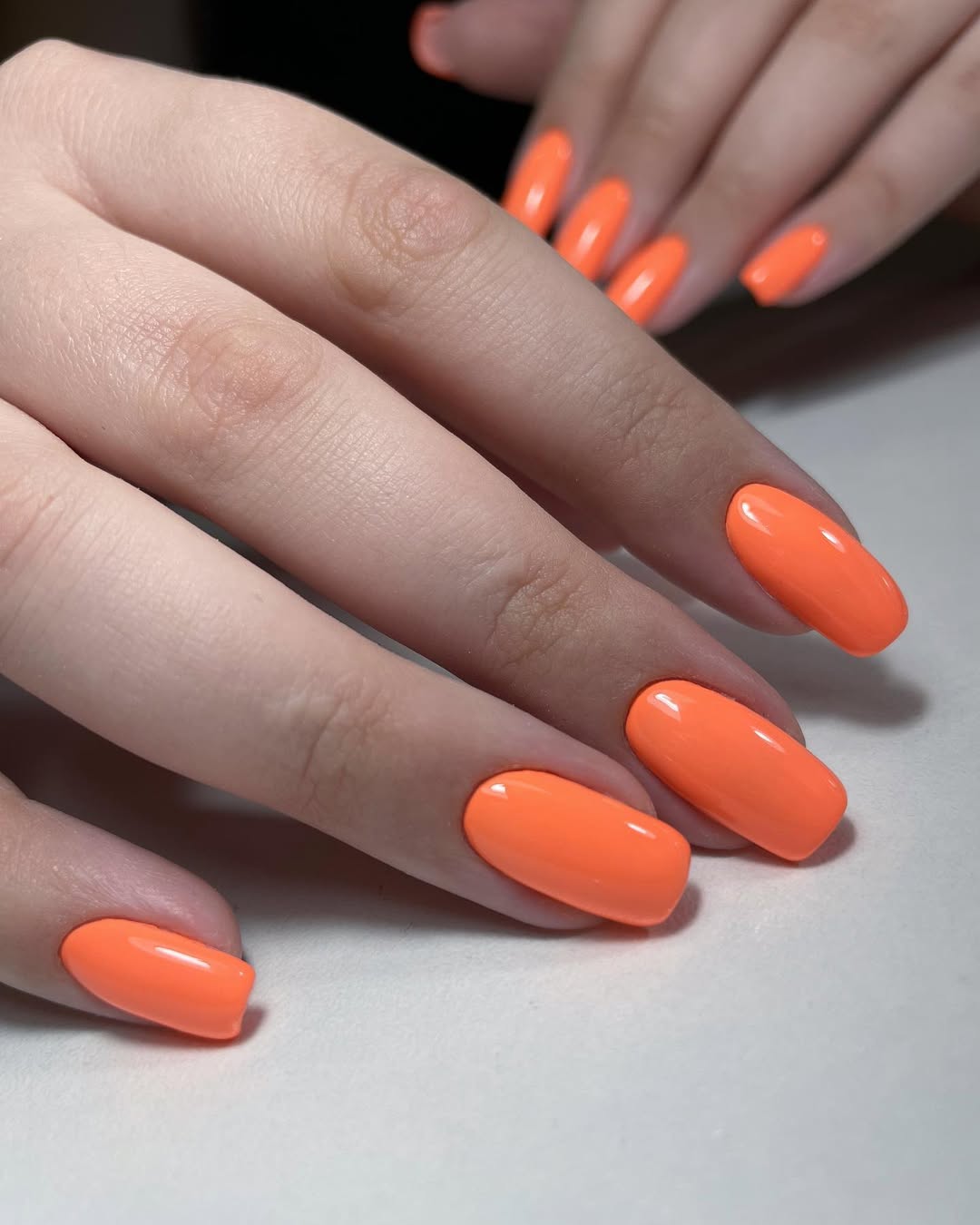 Vibrant Orange Glossy Oval Shaped Nails