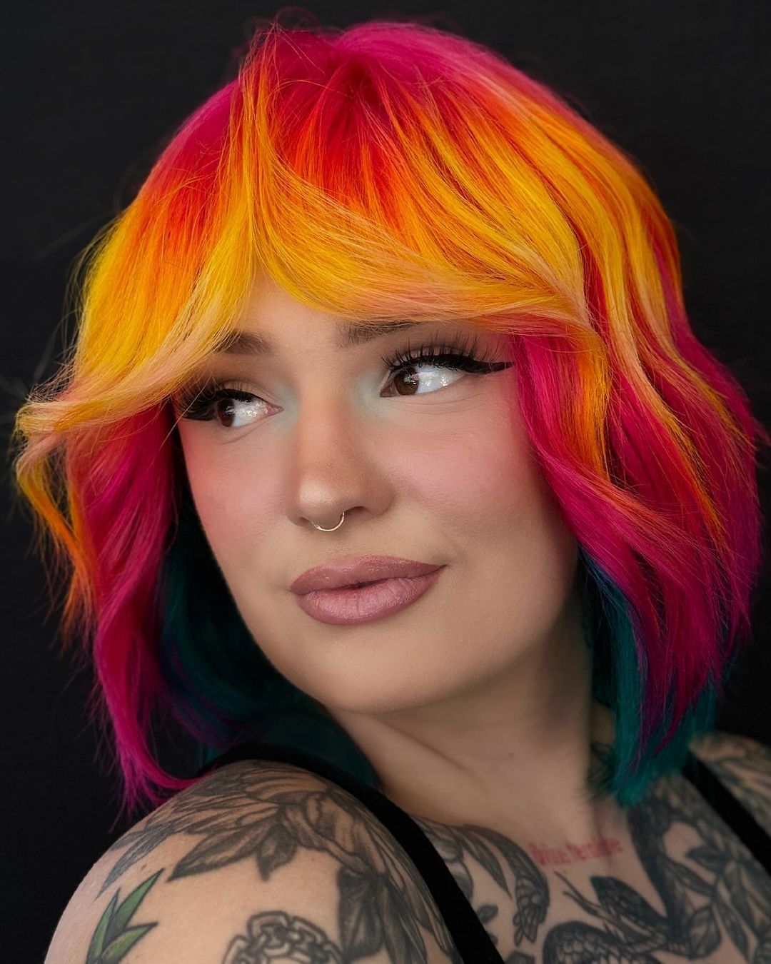 Vibrant Rainbow Chin Length Bob With Curtain Bangs