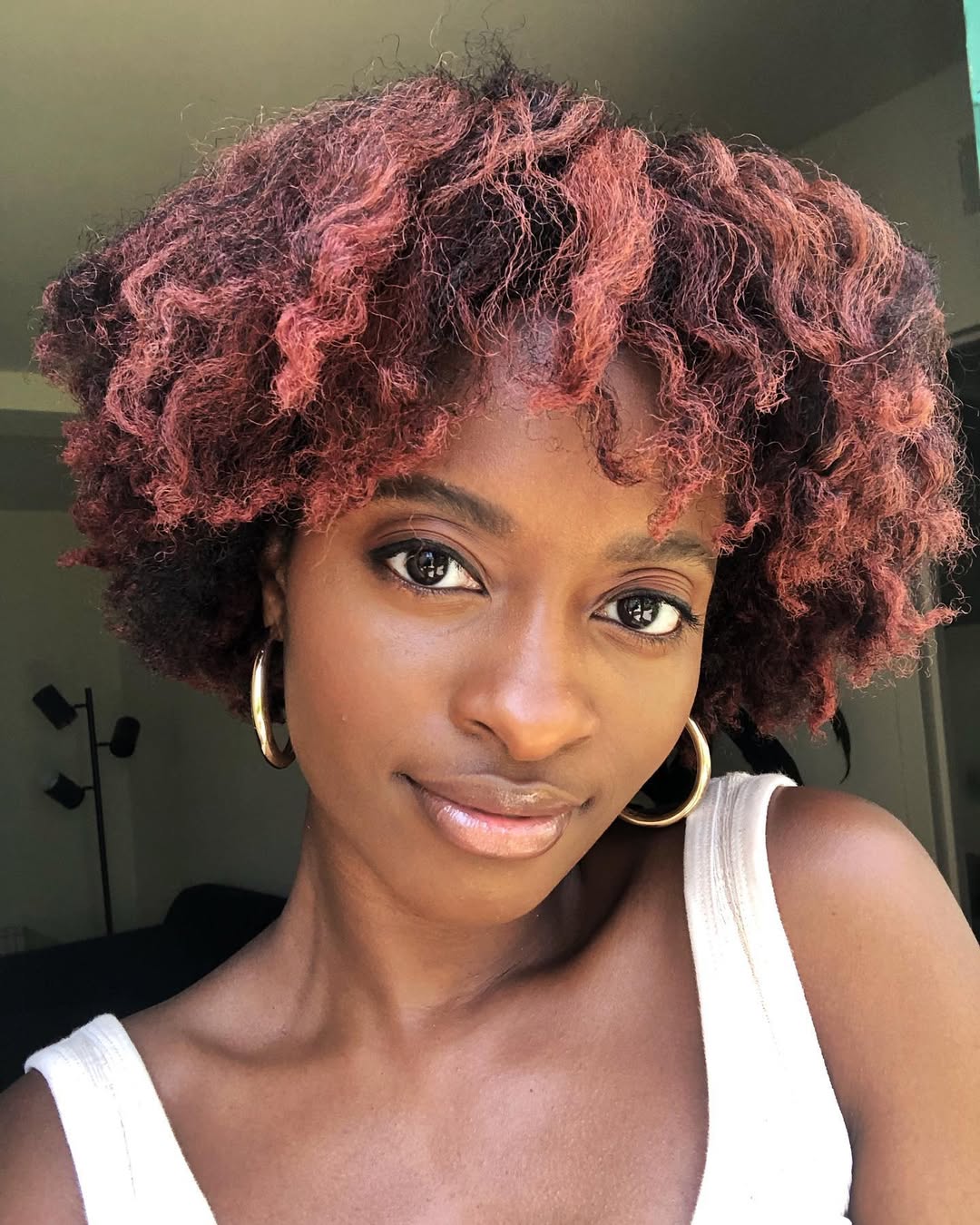 Vibrant Reddish-Pink Defined Curls