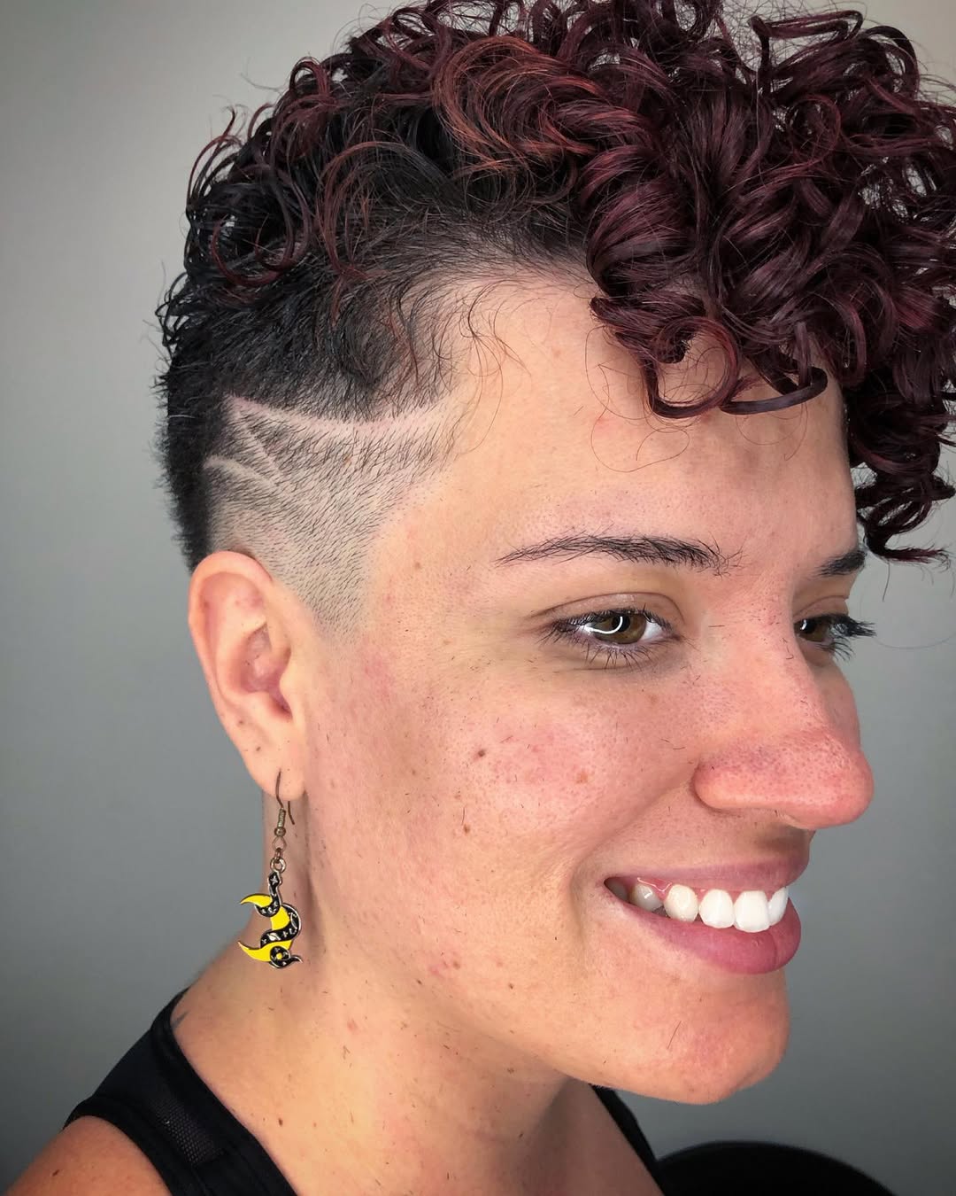 Vibrant Tapered Undercut With Burgundy Curls