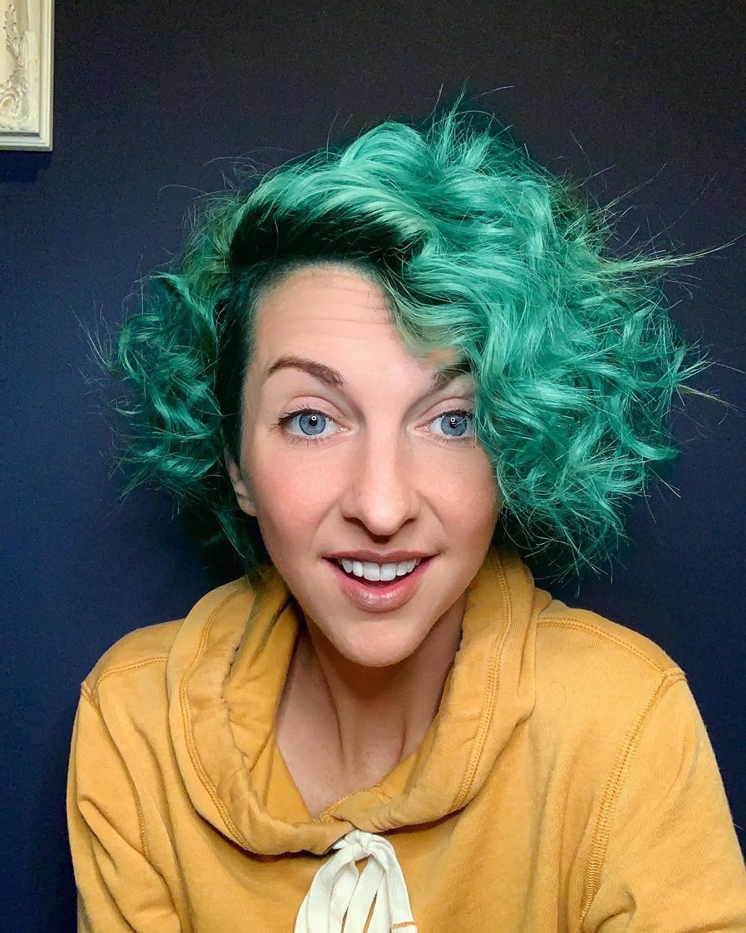 Vibrant Teal Pixie With Curly Texture