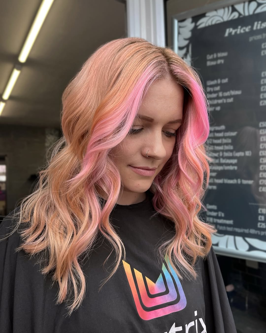 Vibrant Two-Toned Peach and Pink Wavy Hair