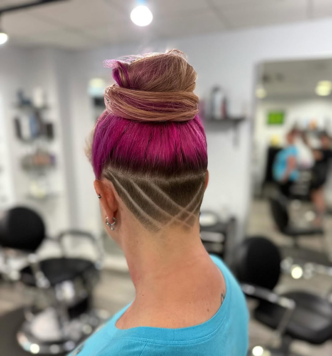 Vivid Pink Top Knot With Intricate Undercut Design