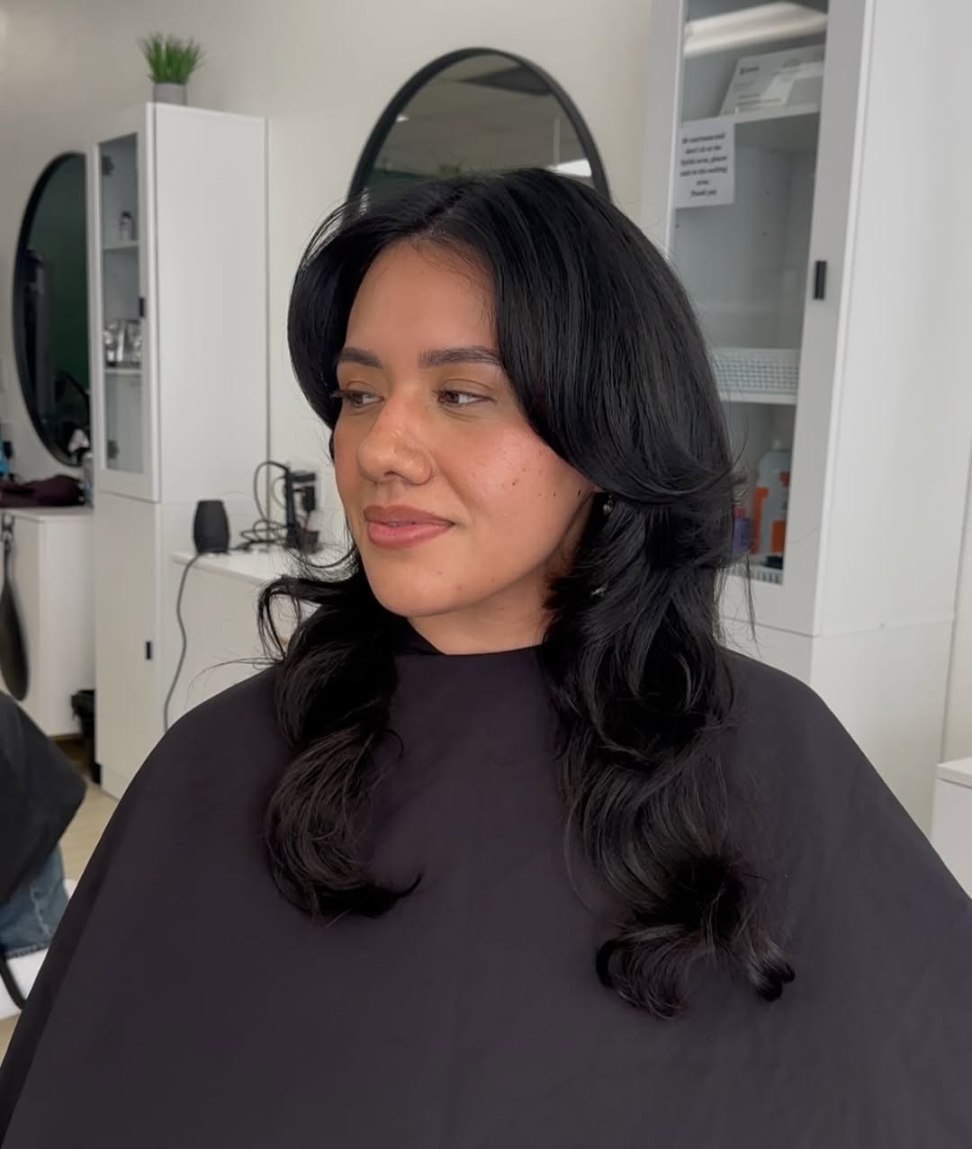Voluminous Black Hair With Face-Framing Layers