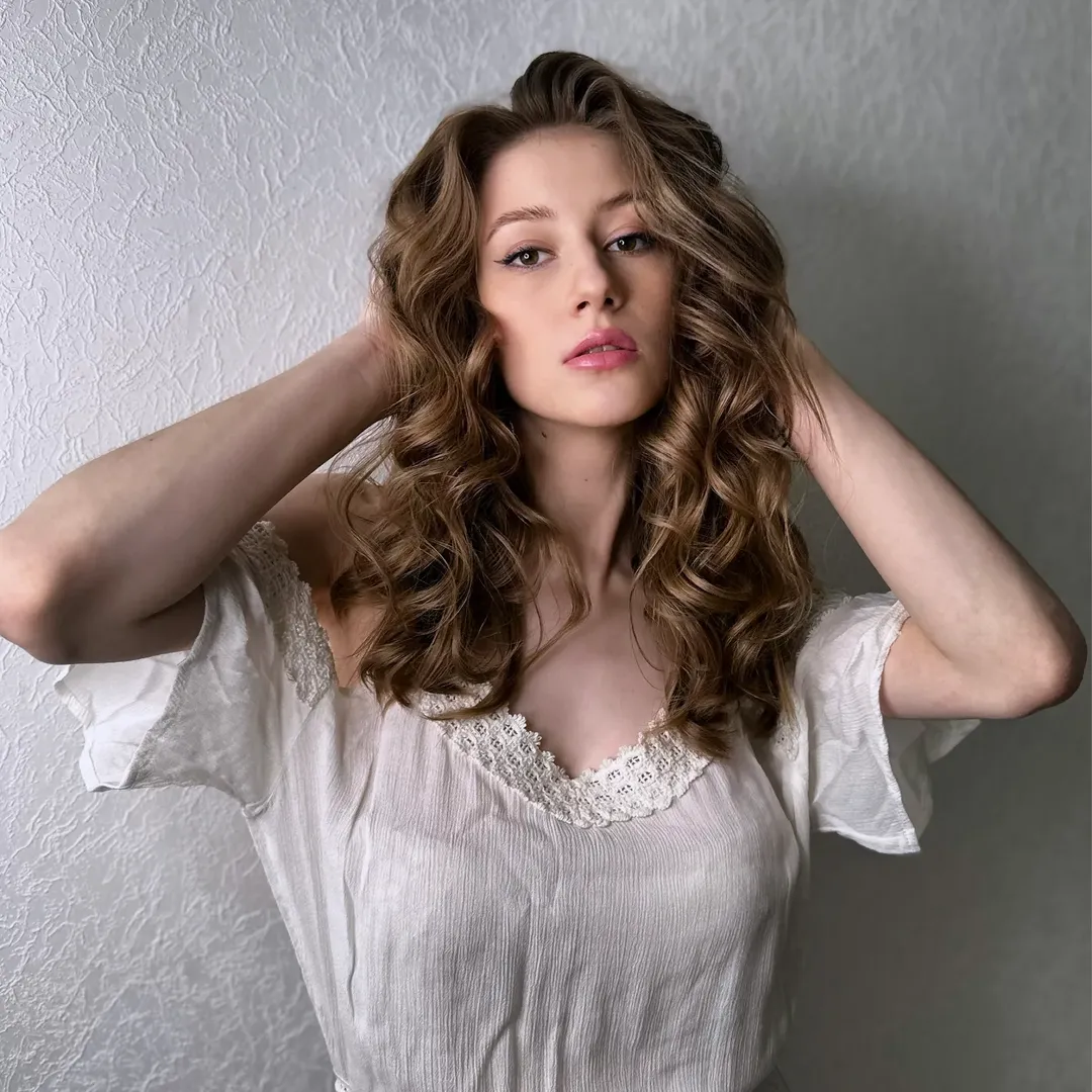 Voluminous Honey Blonde Waves With Defined Curls