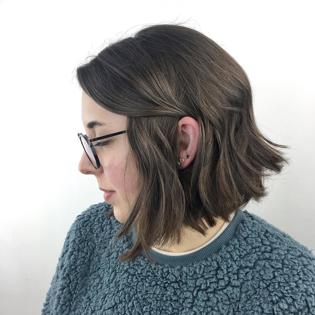 Wavy Chin-Length Bob With Side Part