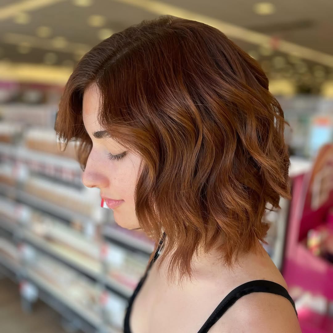 Wavy Copper Bob Layers with Side Part