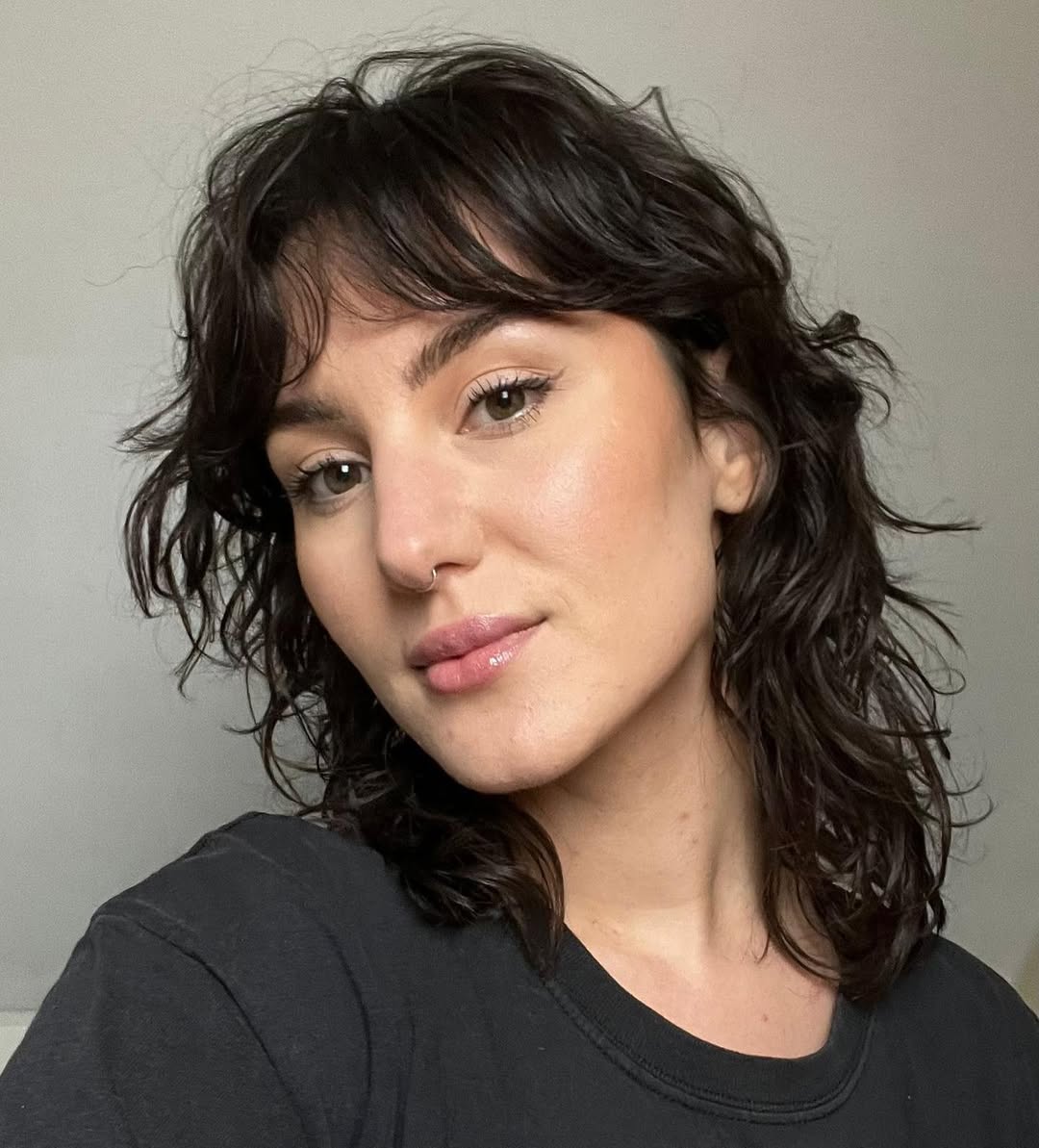 Wavy Dark Brunette Shag With Wispy Bangs