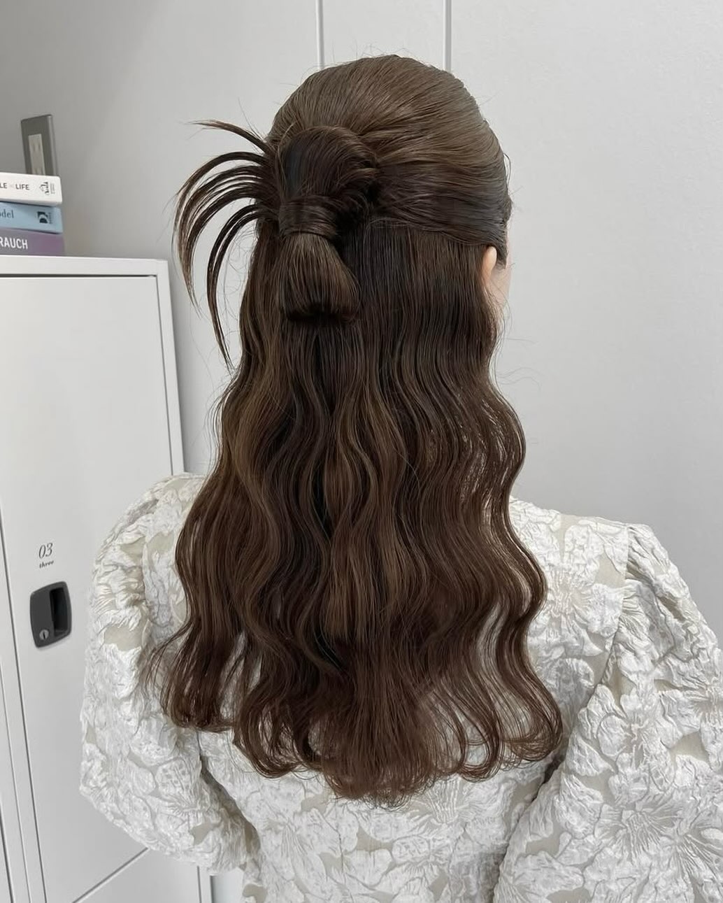 Wavy Half-Up Bow With Piecey Volume