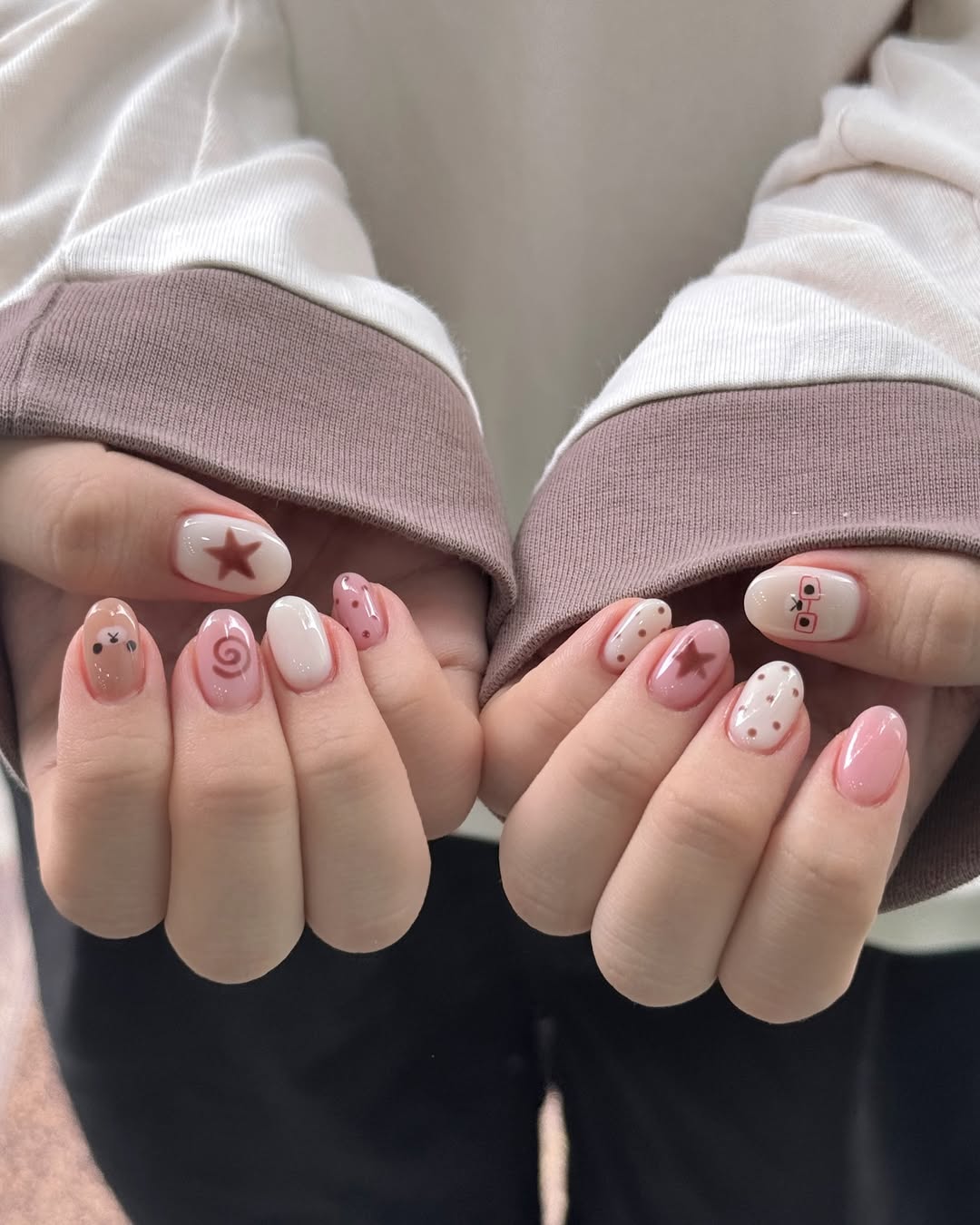 Whimsical Pastel Pink And Brown Mismatched Almond Nails