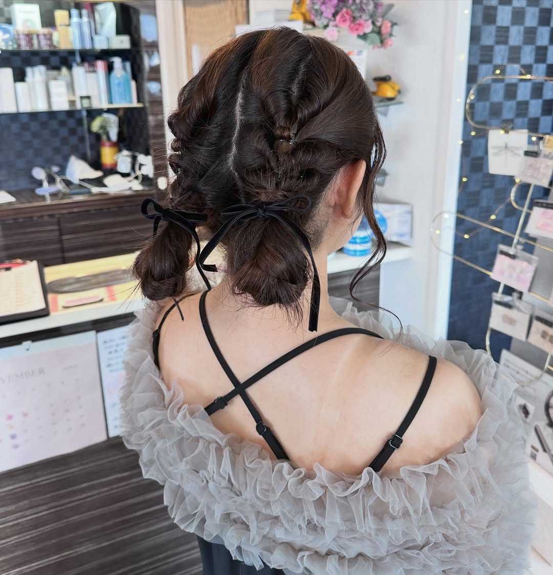 Whimsical Twisted Pigtails With Velvet Ribbons