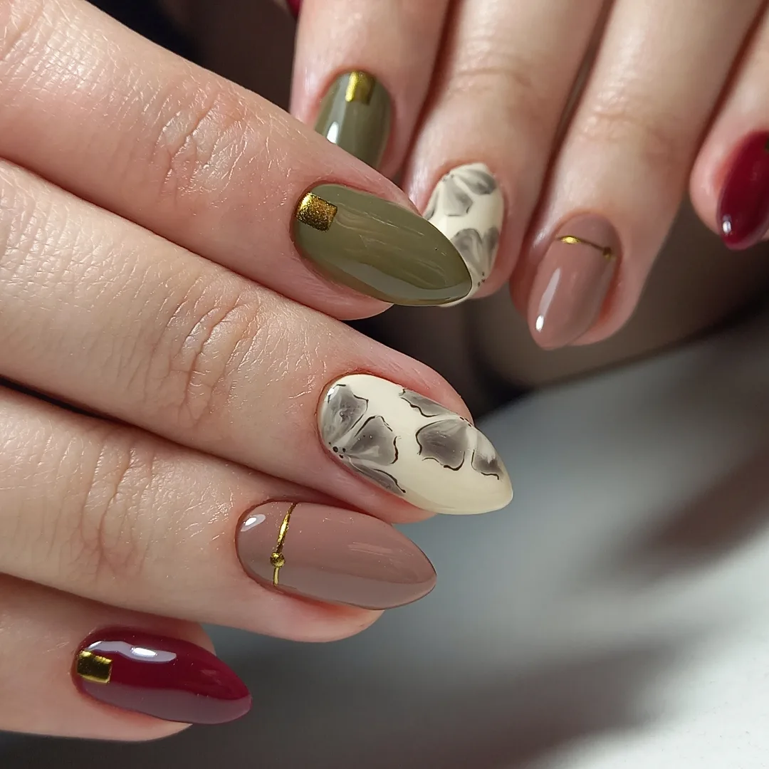 Autumnal Floral Almond Nails with Gold Accents