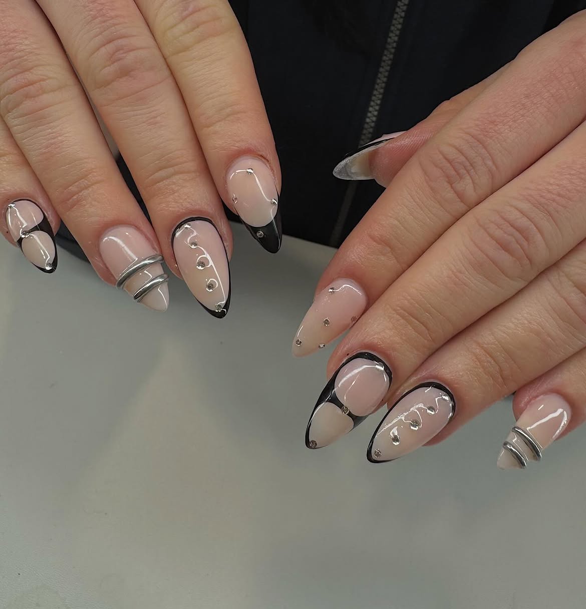 Black French Tip Almond Nails with Rhinestones