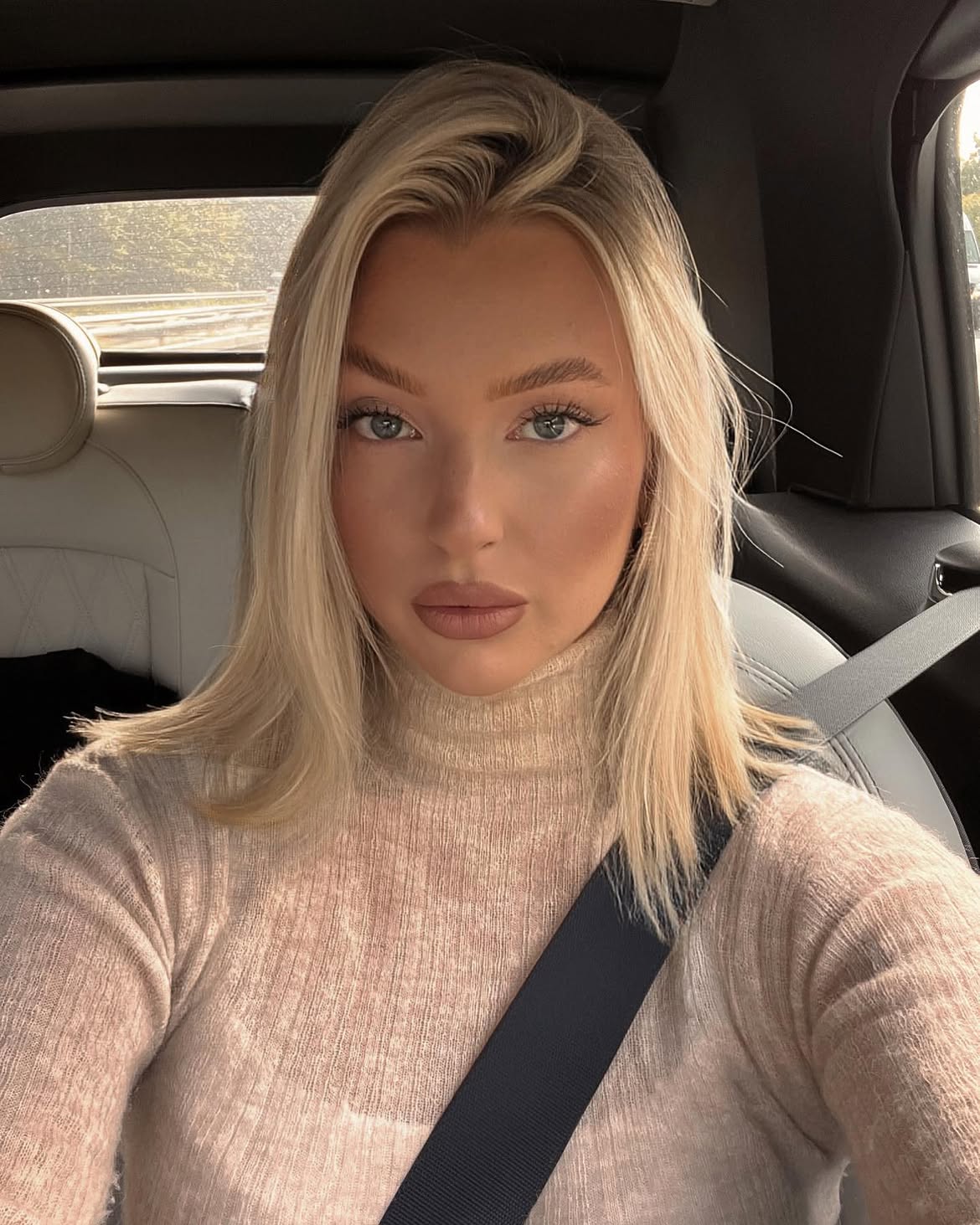 Blonde Collarbone Cut With Face Framing Layers