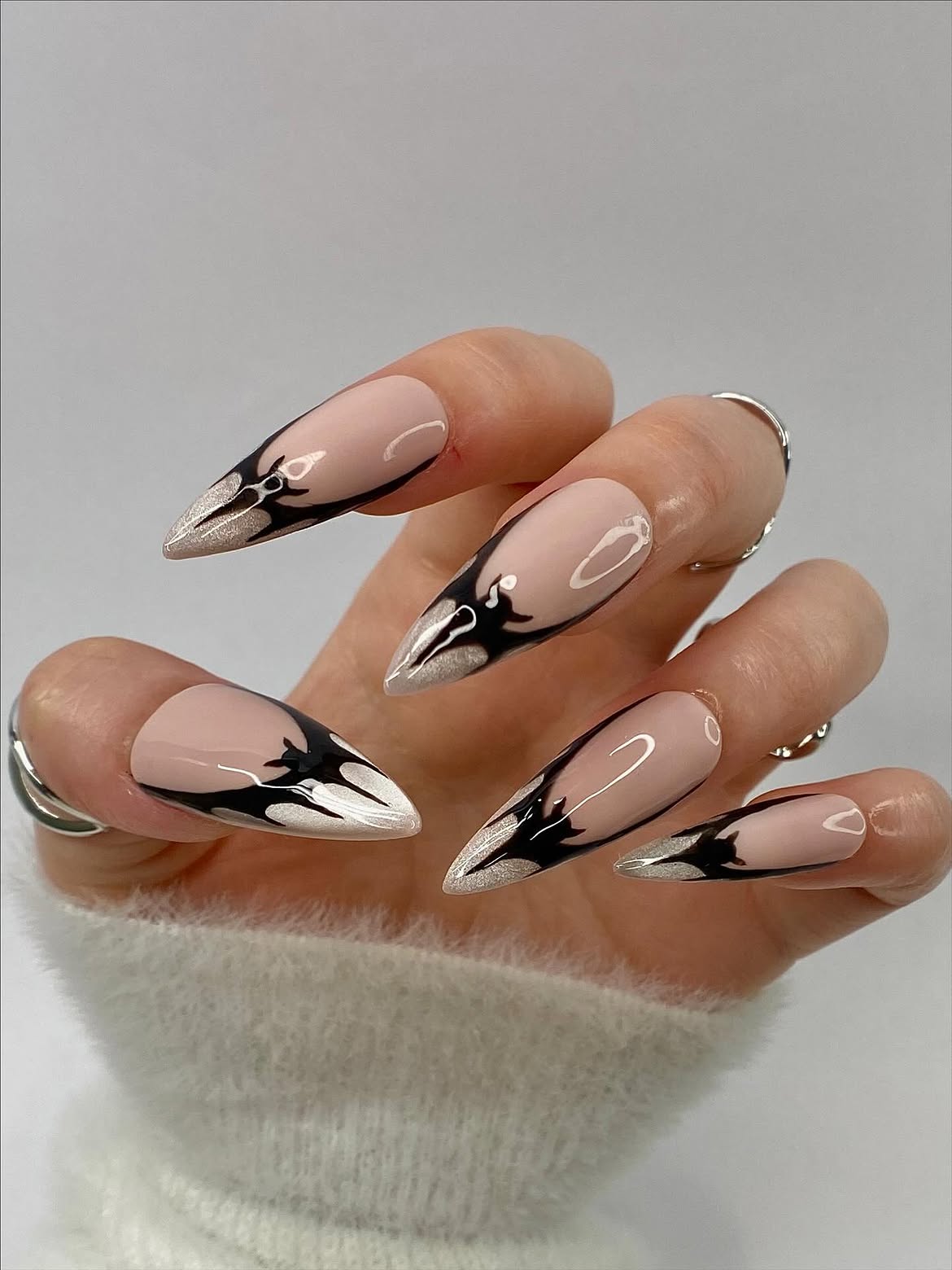 Blush Nude Stiletto Nails with Black Flame Accent