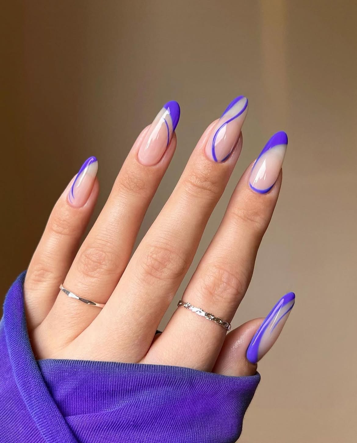 Bold Purple Swirl French Almond Nails