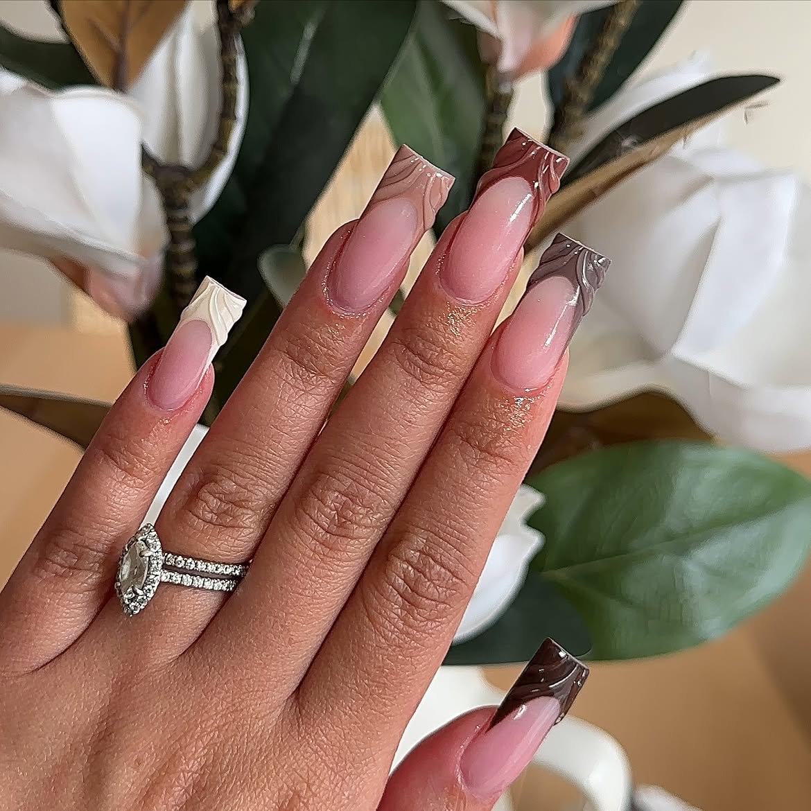 Brown and White Swirl French Tip Almond Nails