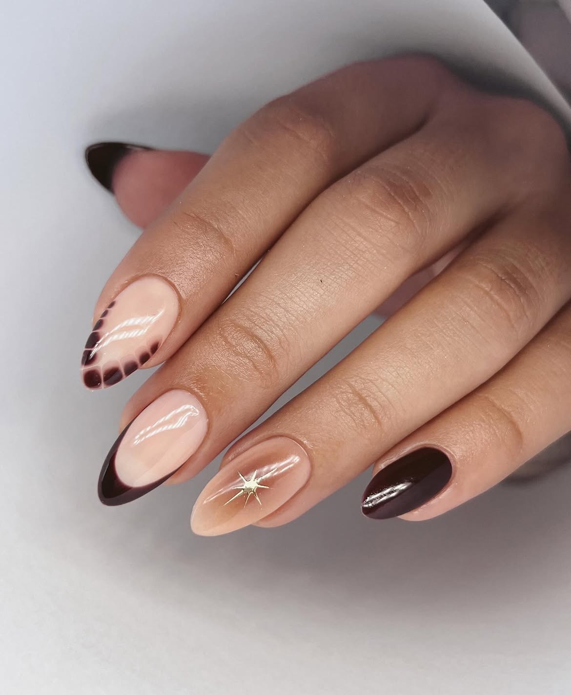 Brown French Ombre Almond Nails with Star Accent