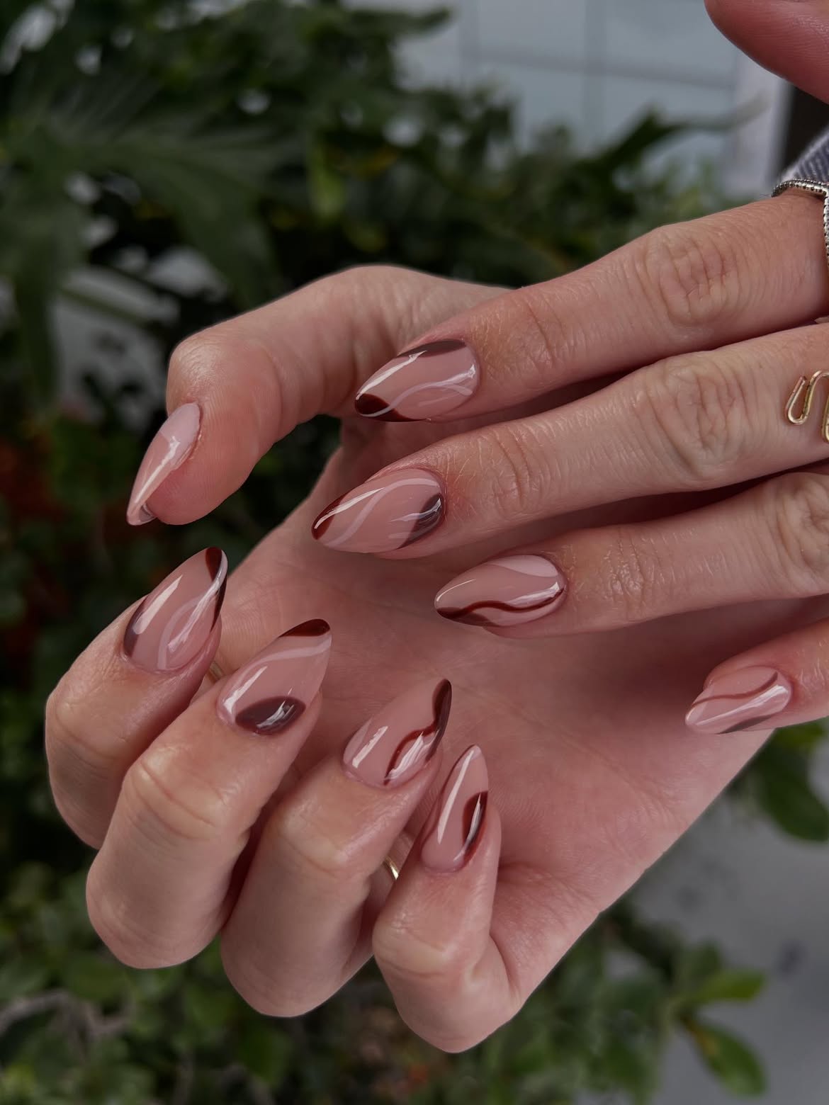 Brown Swirl French Tip Almond Nails