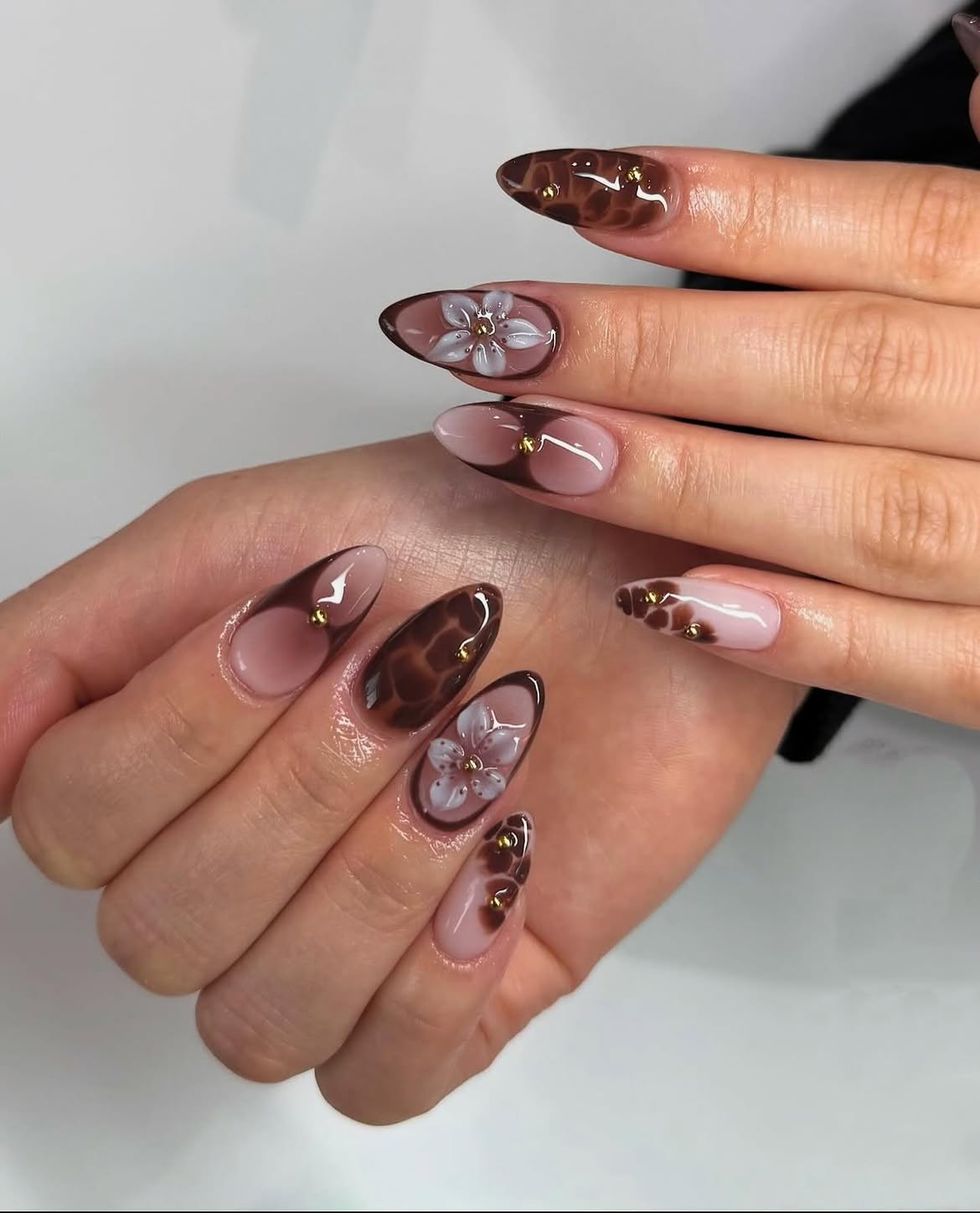 Brown Tortoiseshell Floral Almond Nails