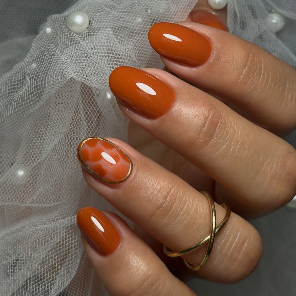 Burnt Orange Oval Marble with Gold Accents