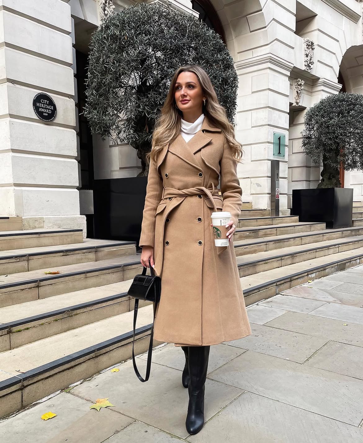 Camel Trench Coat With Black Boots And Mini Bag