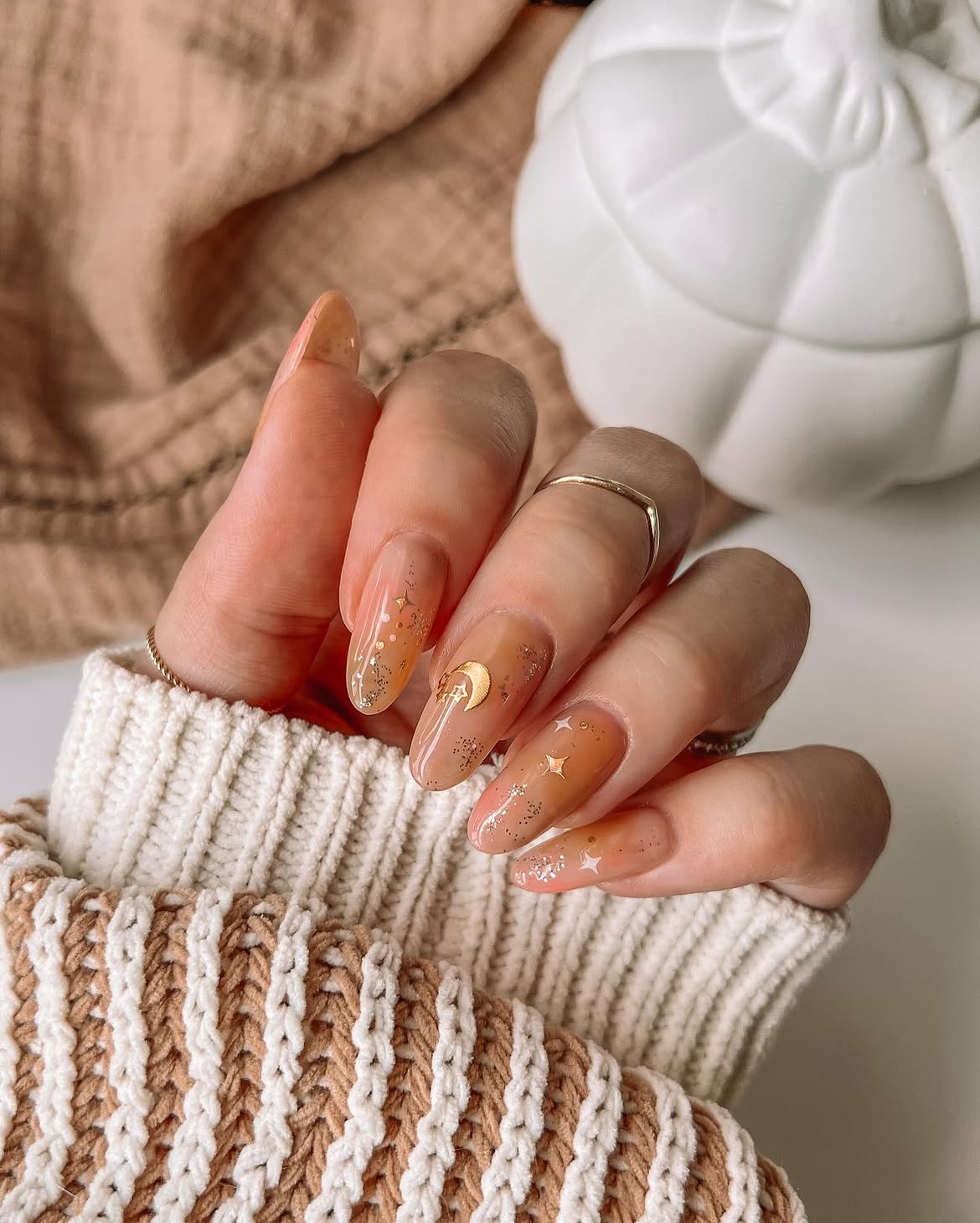 Celestial Beige Jelly Almond Nails with Star Accents