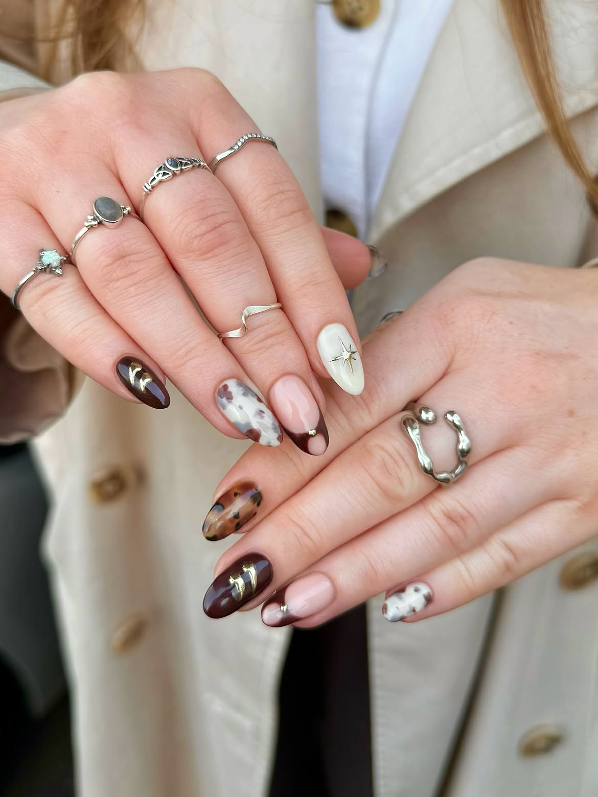 Chic Animal Print & Gold Detail Almond Nails