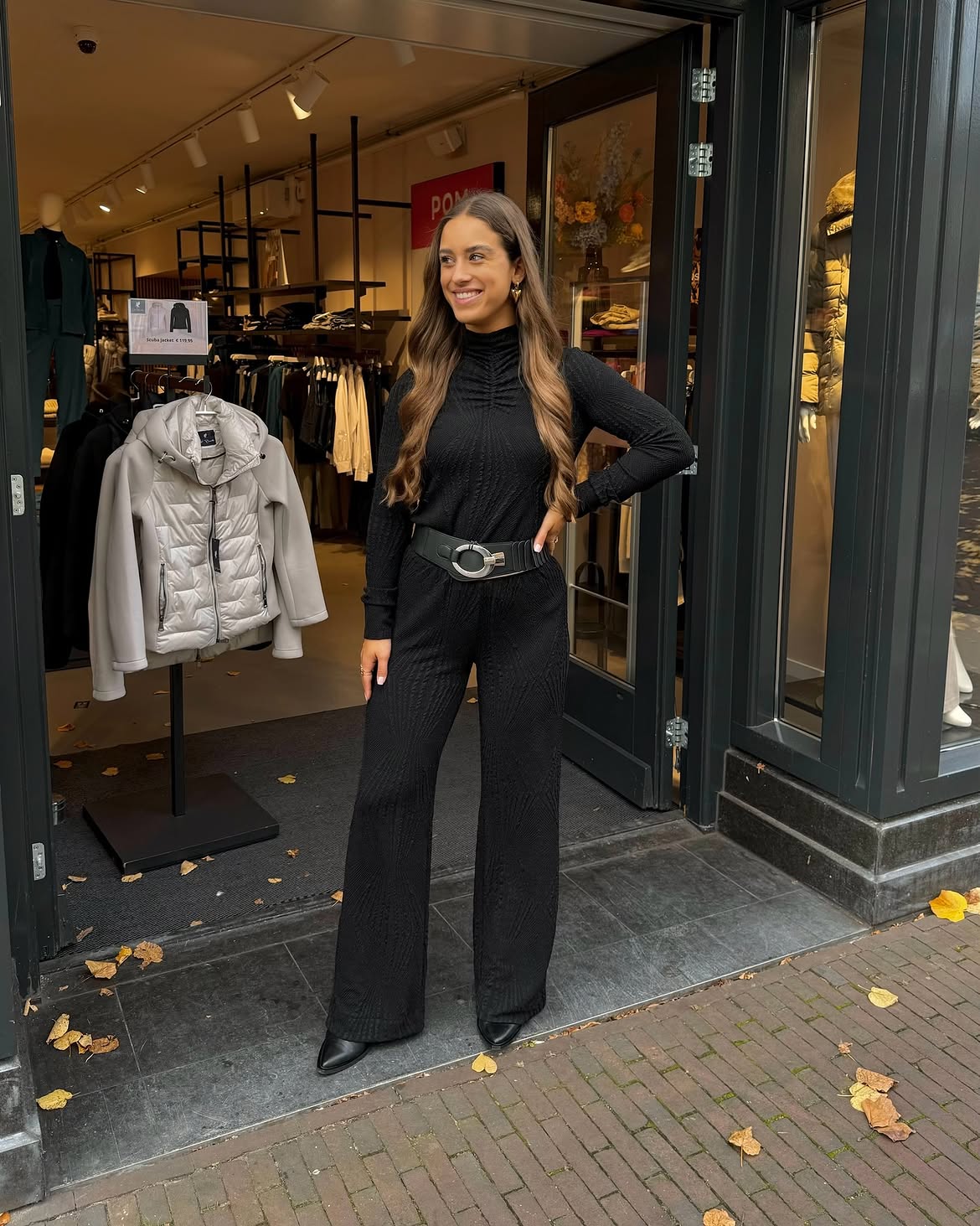 Chic Black Knit Jumpsuit With Statement Belt