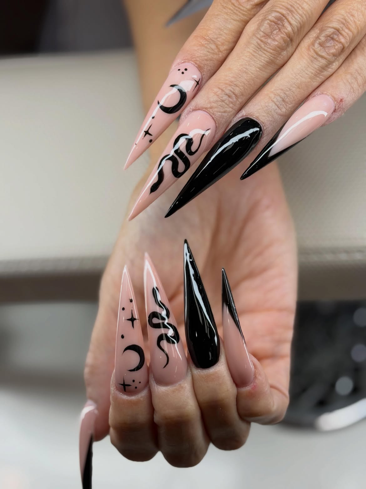 Chic Black Snake & Moon Stiletto Nails