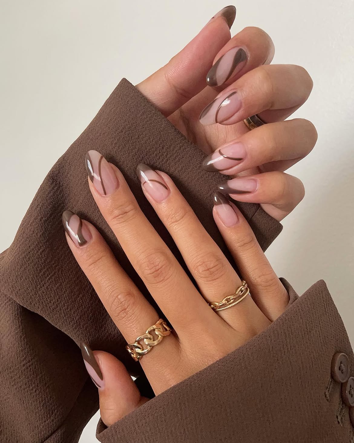 Chic Swirl French Tip Almond Nails