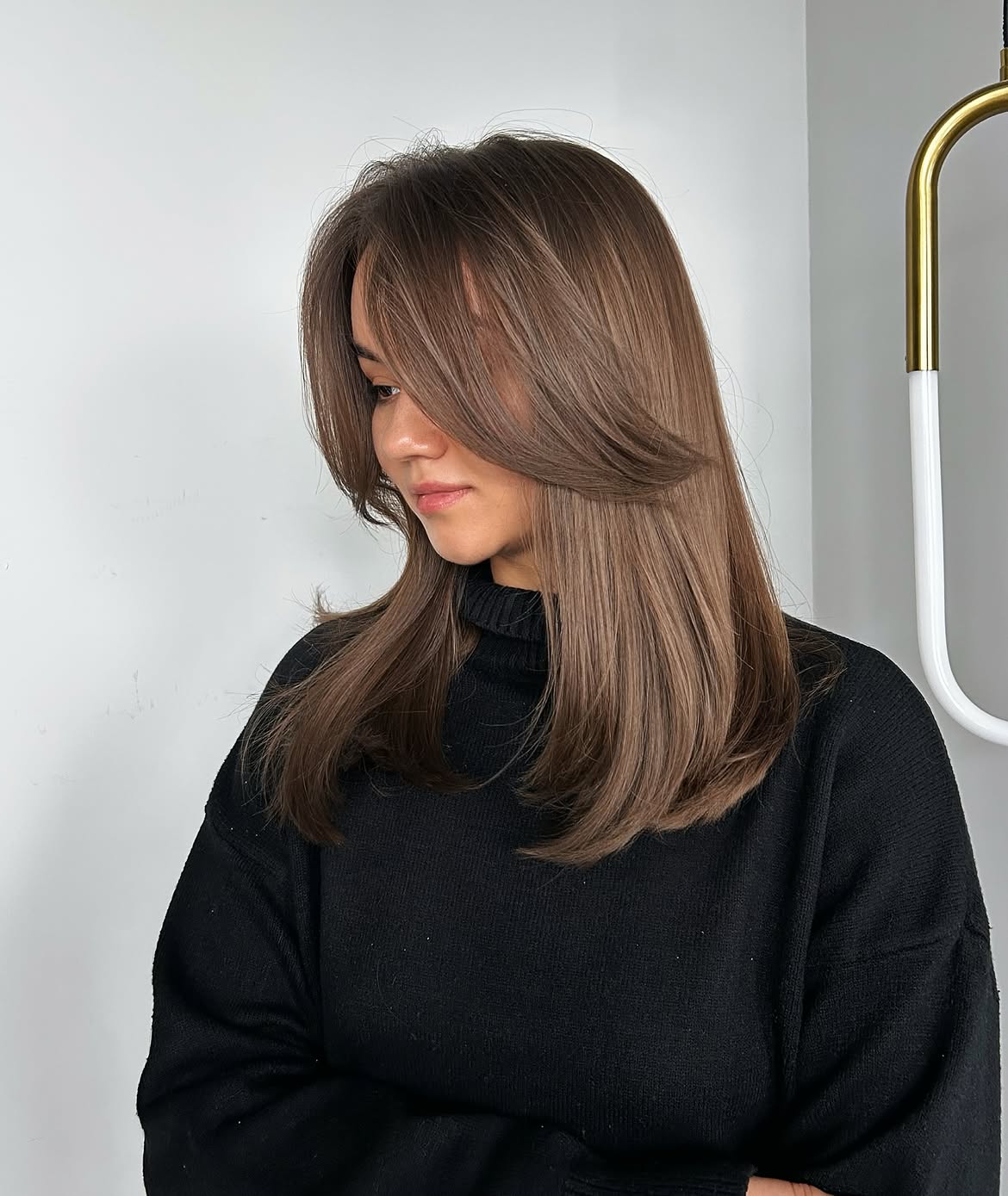 Chocolate Brown Layers With Face-Framing Curtain Bangs